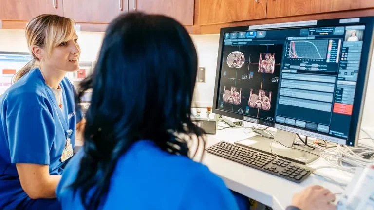 Doctors looking at medical data