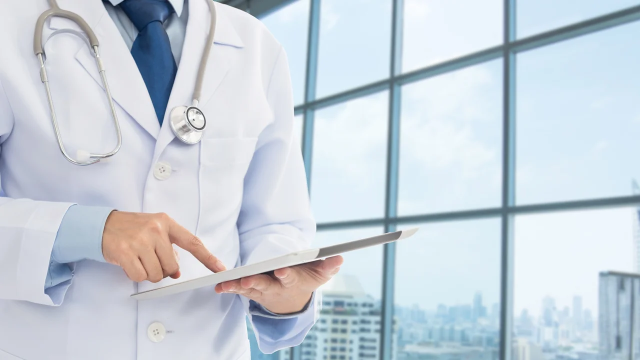 Doctor holding tablet