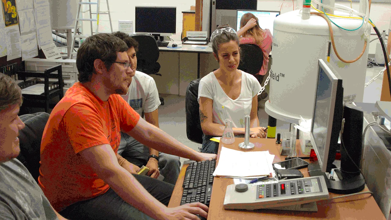 MIC lab workers at computer