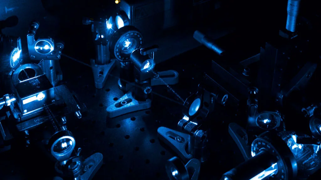 A collection of microscopes in the dark