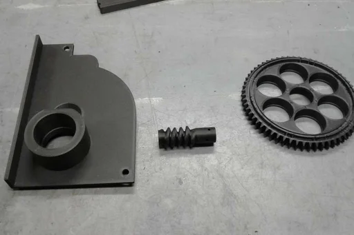 Unique parts fabricated for a custom microscope.