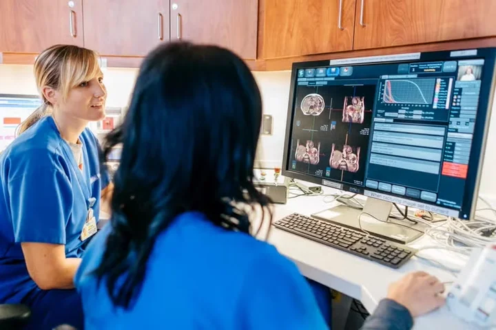 Doctors looking at medical data