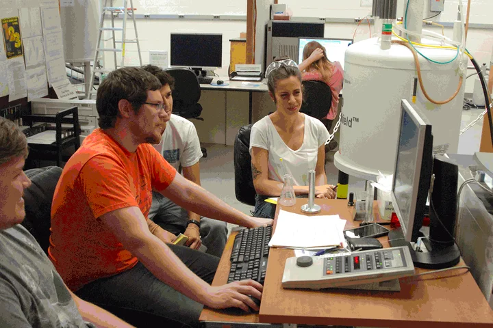 MIC lab workers at computer