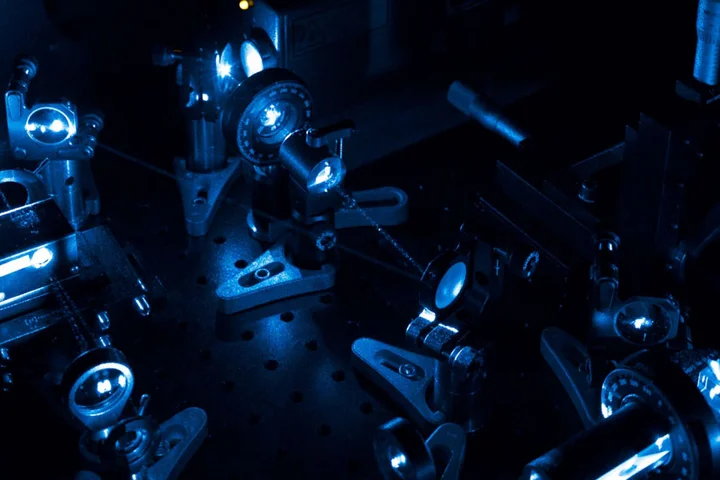 A collection of microscopes in the dark