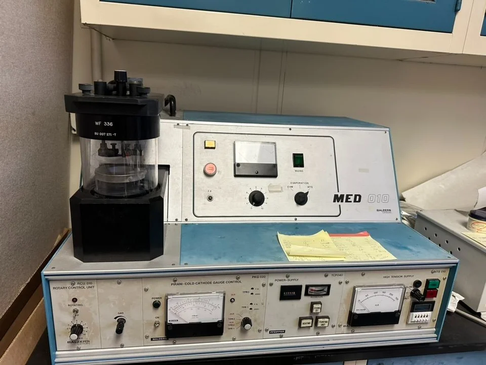 Balzers MED 010 vacuum coating system with rotary control and gauge modules.